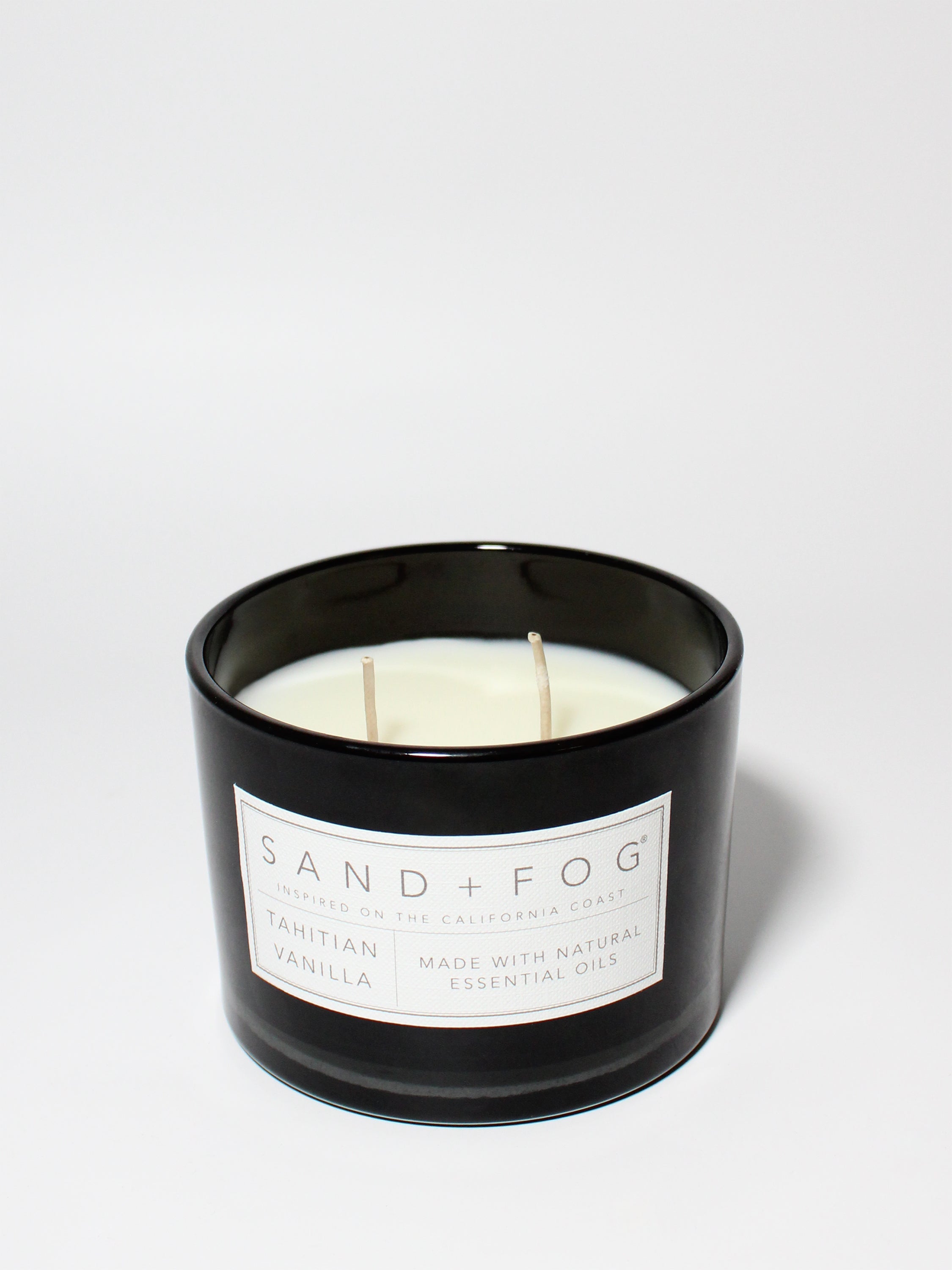 Tahitian Vanilla 12 oz scented candle Black vessel with Carved geometric lid