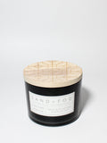 Tahitian Vanilla 12 oz scented candle Black vessel with Carved geometric lid