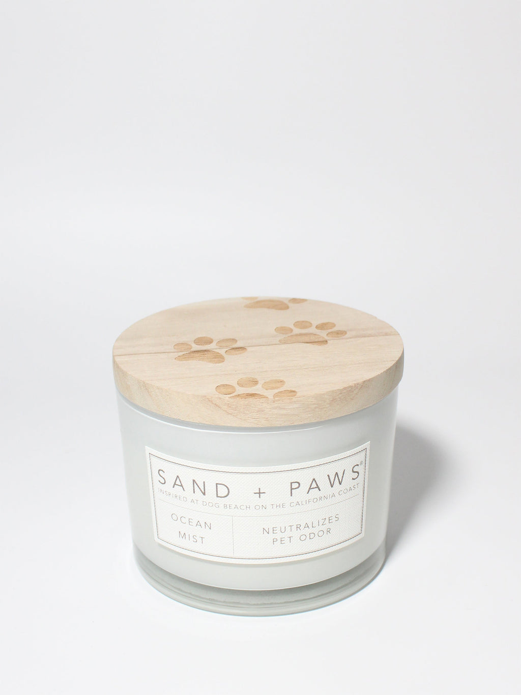 Sand + Paws Ocean Mist 12 oz scented candle White vessel with Carved Paw Print lid