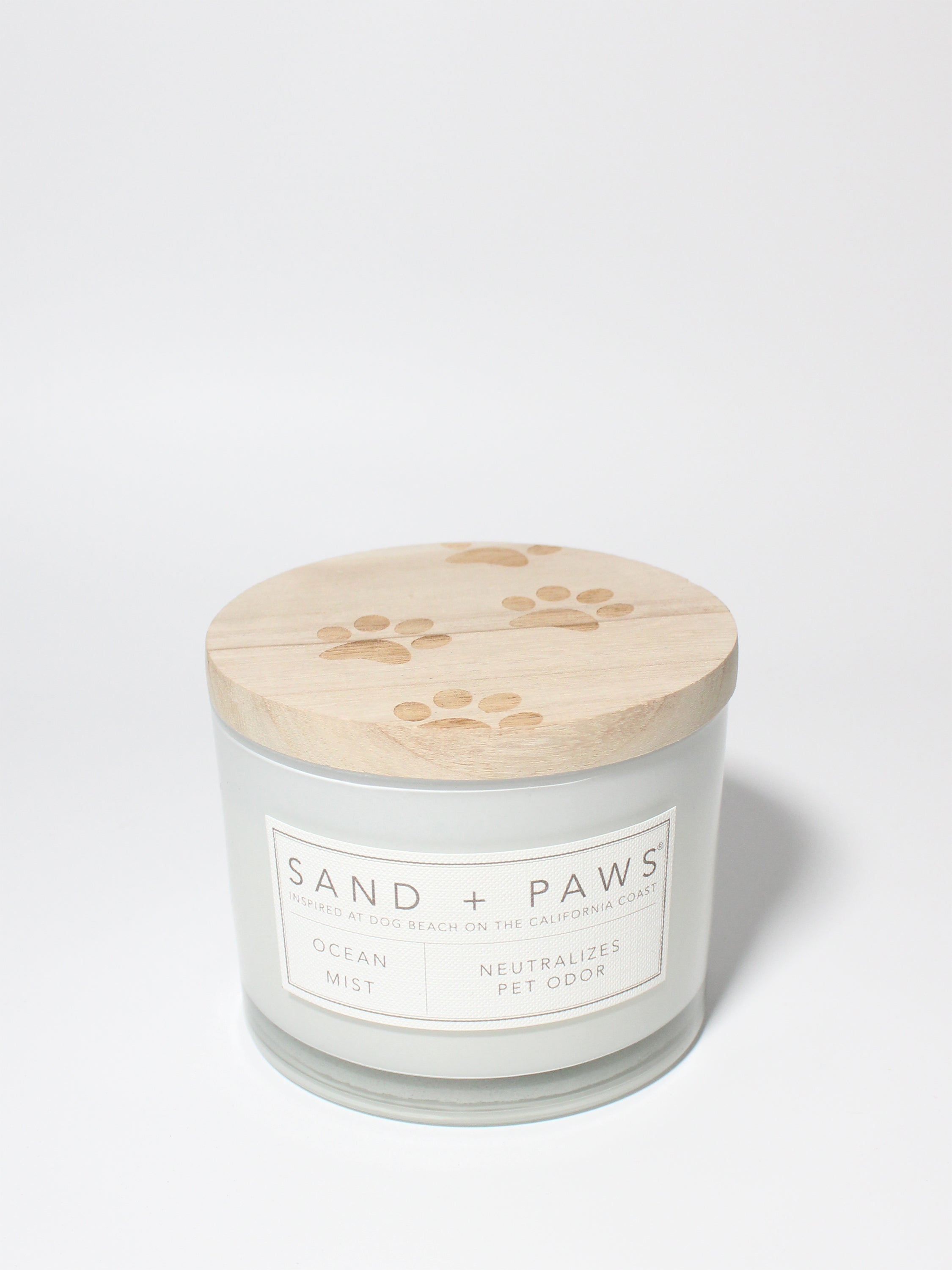 Sand + Paws Ocean Mist 12 oz scented candle White vessel with Carved Paw Print lid