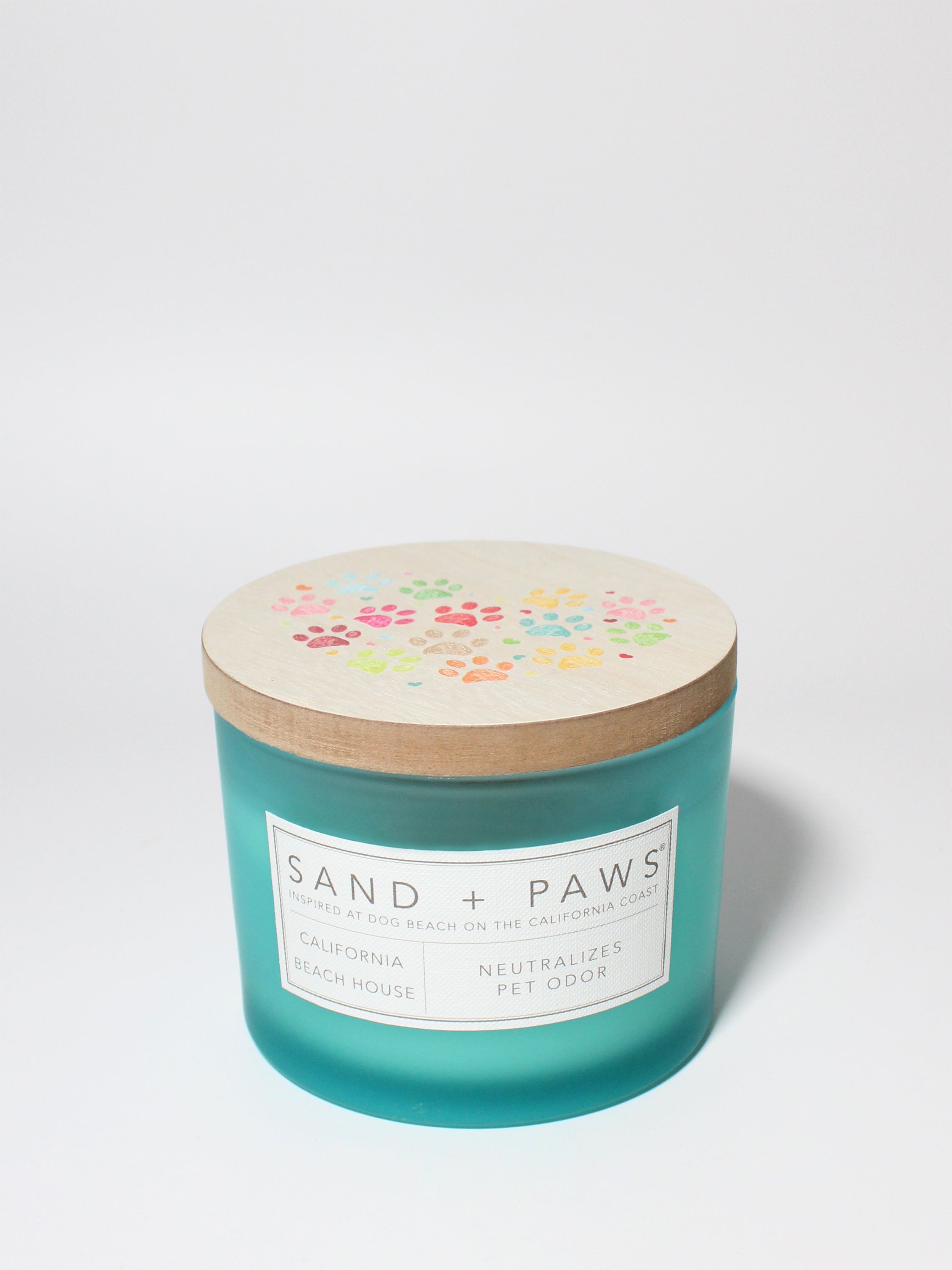 Sand + Paws California Beach House 12 oz scented candle Coast vessel with Painted Colorful Paw Prints in Heart Shape lid