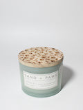 Sand + Paws Ocean & Sea Salt 12 oz scented candle Seaglass vessel with Carved Paws and Bones lid