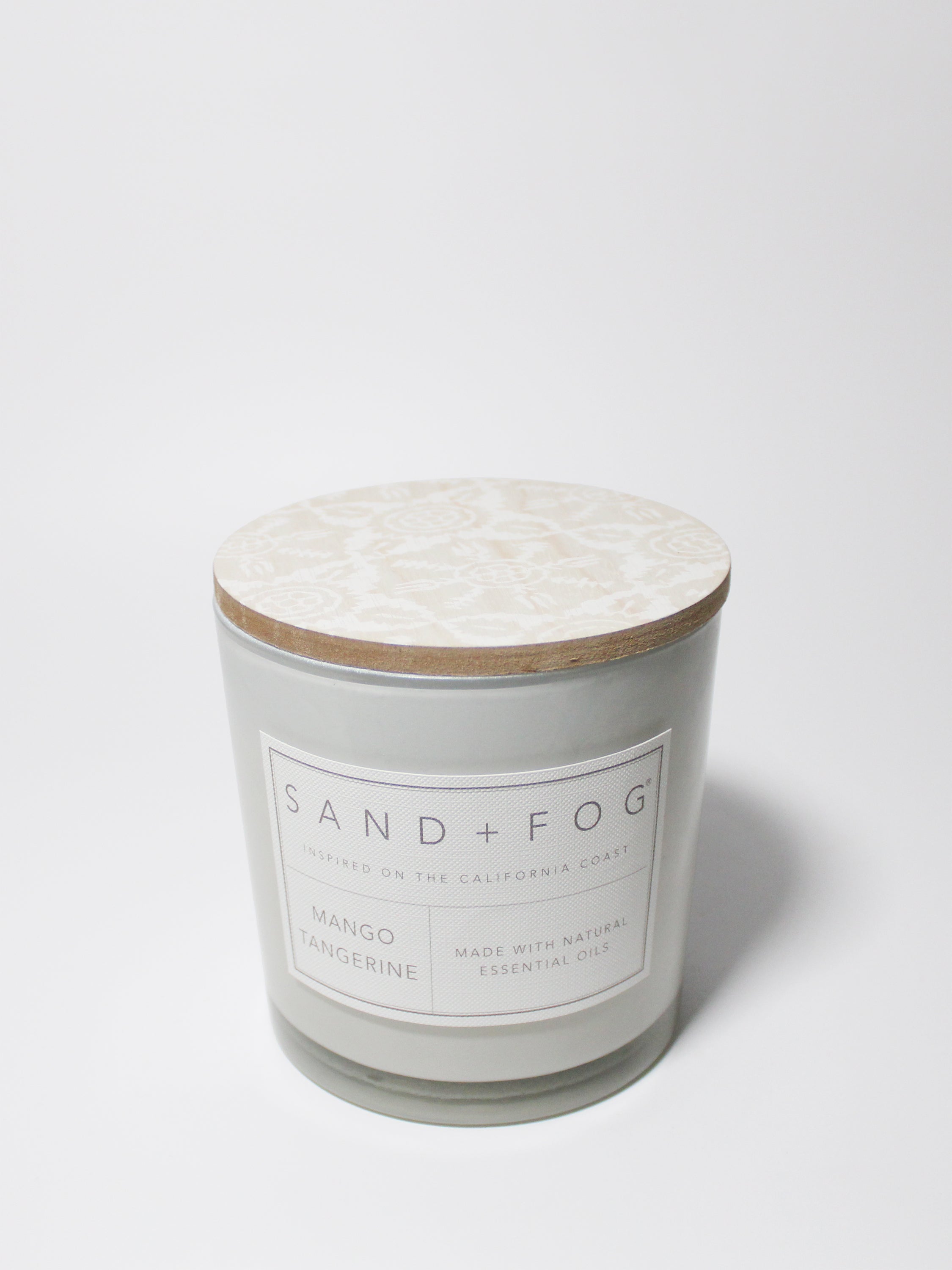 Mango Tangerine 21 oz candle with a wood lid